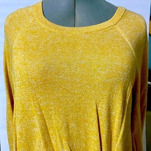 This is a Yellow long sleeve cotton Jersey knit.